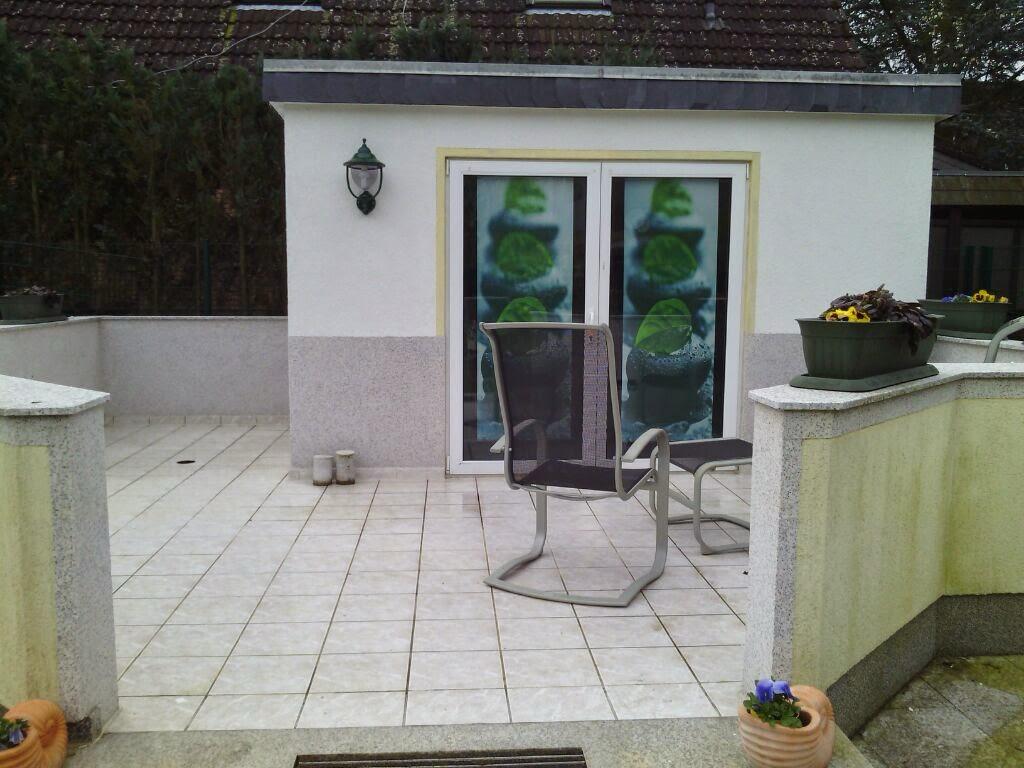Fertige Dachterrasse mit Fliesen